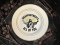 Vintage plate with the words Disappointments. All of You.