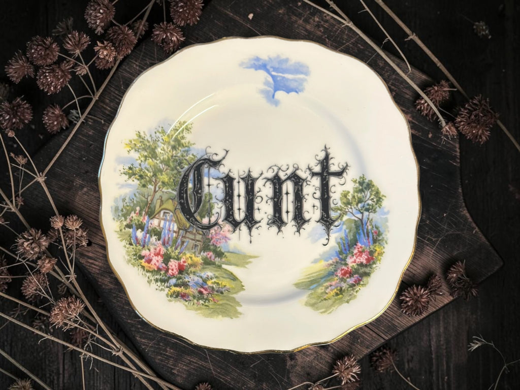 Vintage plate with the words Cunt