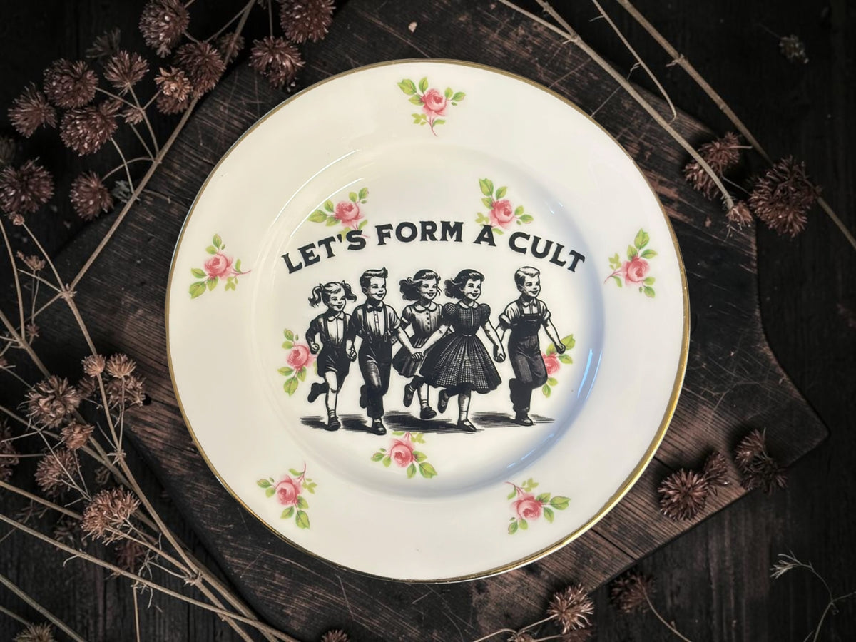 Vintage plate with the words Let's Form a Cult