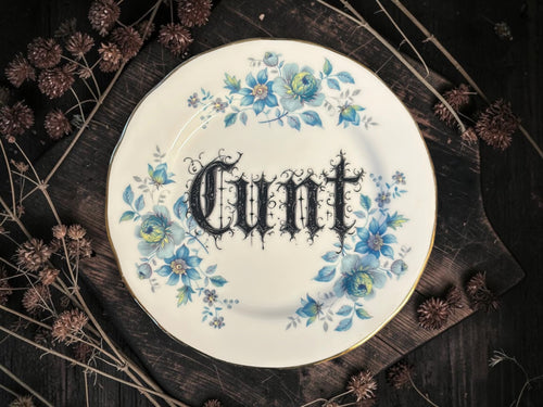 Vintage plate with the words Cunt