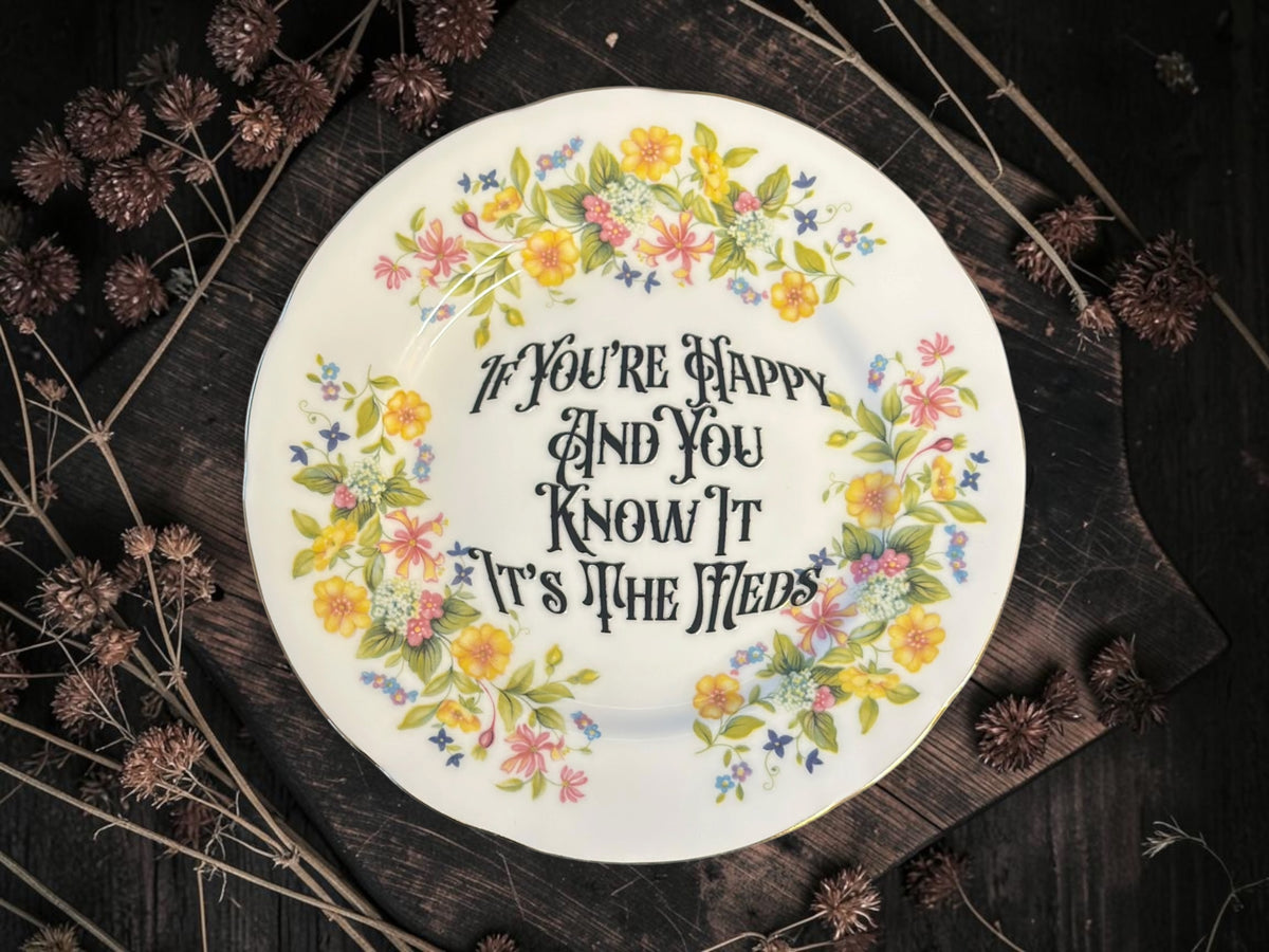 Vintage decorative plate reading If You’re Happy and You Know It, It’s the Meds