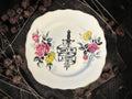 Vintage decorative plate reading Don’t Be a Cunt