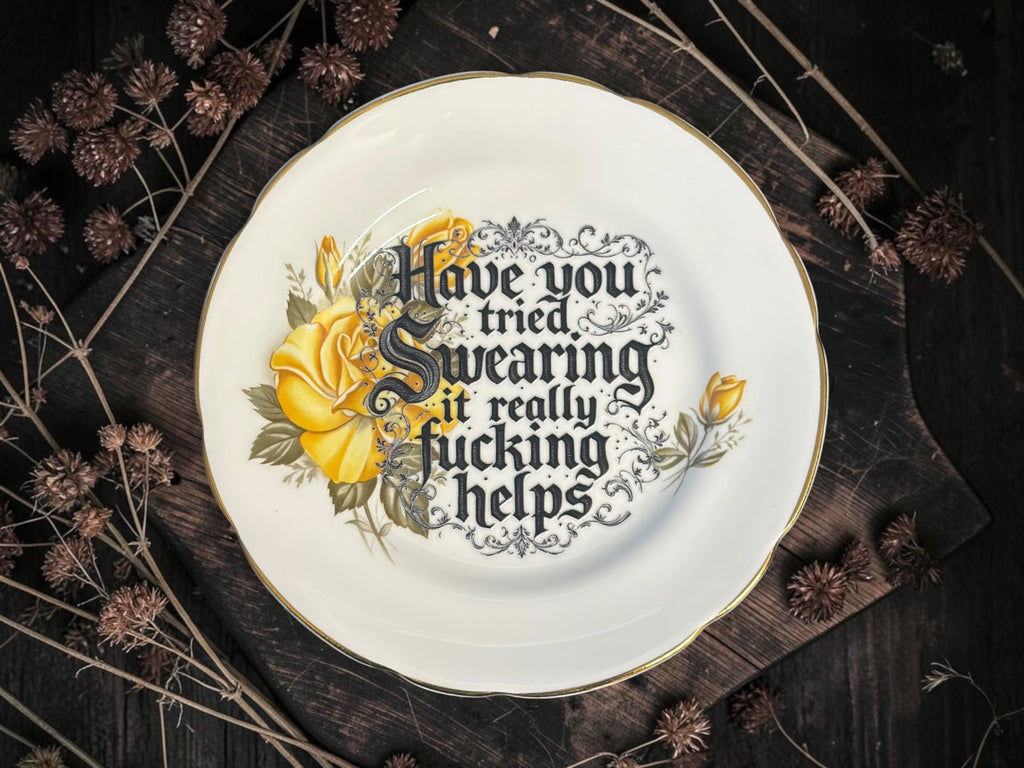 Vintage decorative plate reading Have You Tried Swearing? It Really Fucking Helps