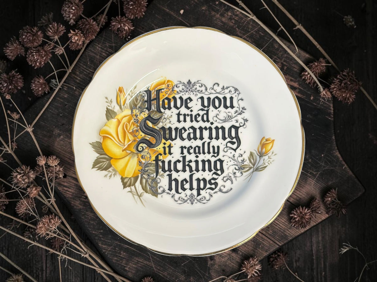 Vintage decorative plate reading Have You Tried Swearing? It Really Fucking Helps