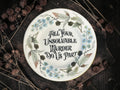 Vintage decorative plate reading Till Your Unsolvable Murder Do Us Part