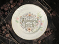 Vintage decorative plate featuring Whimsical Bitch