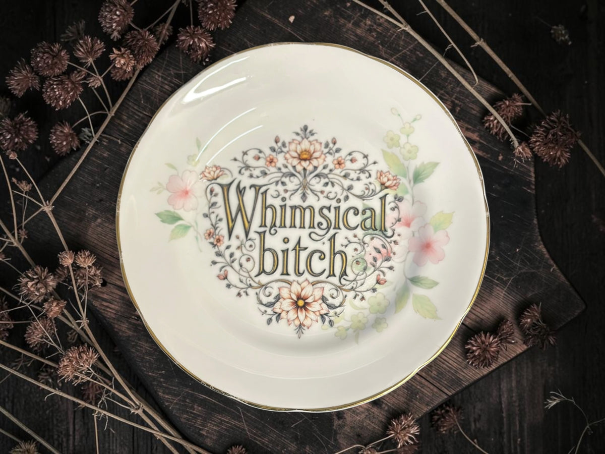 Vintage decorative plate featuring Whimsical Bitch