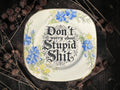 Vintage decorative plate featuring Don't Worry About Stupid Shit