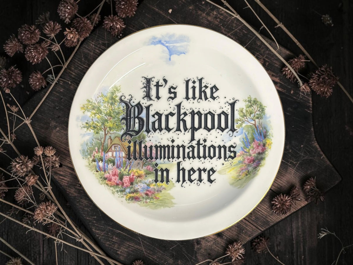 Vintage decorative plate featuring It's Like Blackpool Illuminations in Here