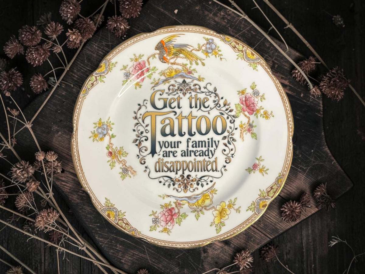 Vintage decorative plate featuring Get the Tattoo, Your Family Are Already Disappointed