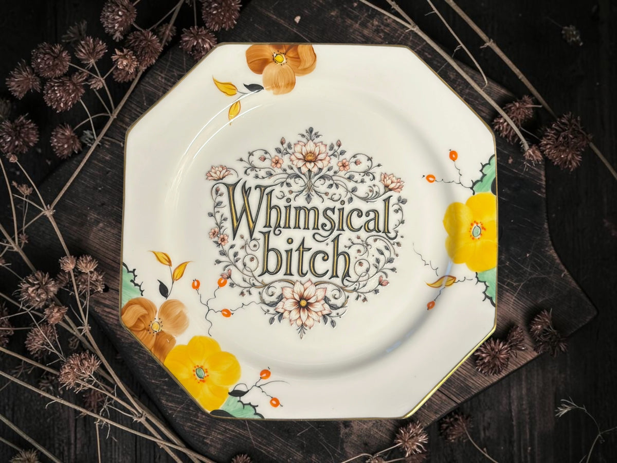 Vintage decorative plate reading Whimsical bitch