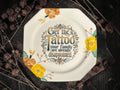 Vintage decorative plate reading Get the tattoo, your family are already disappointed