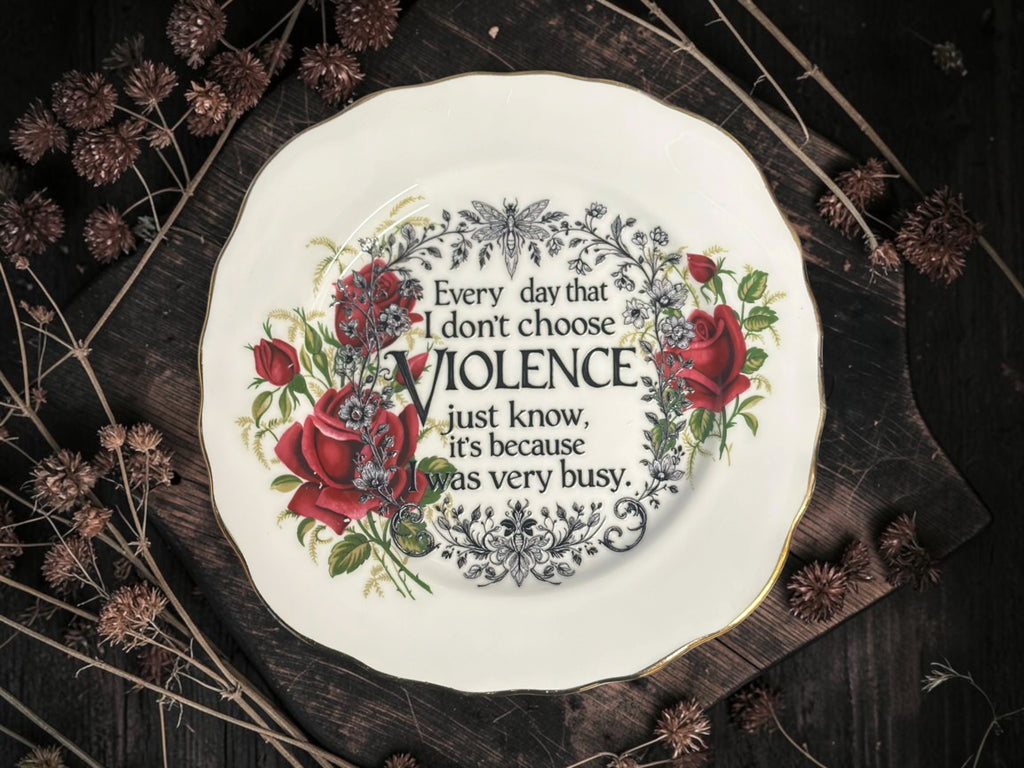 Vintage decorative plate reading Every day that I don’t choose violence just know, it’s because I was very busy.