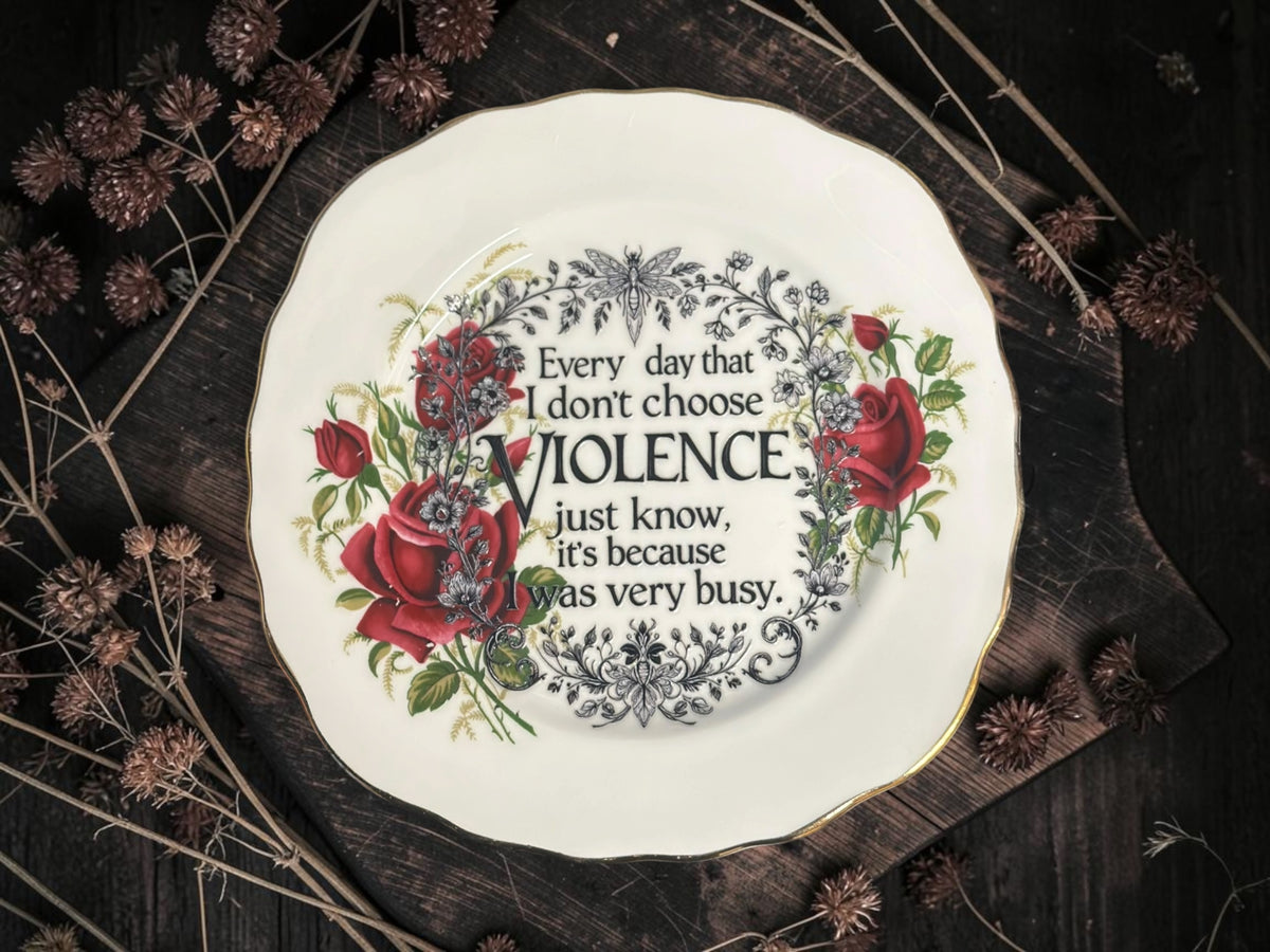 Vintage decorative plate reading Every day that I don’t choose violence just know, it’s because I was very busy.