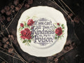 Vintage decorative plate reading If you can’t kill them with kindness try poison