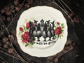 Vintage decorative plate reading Girls will be girls