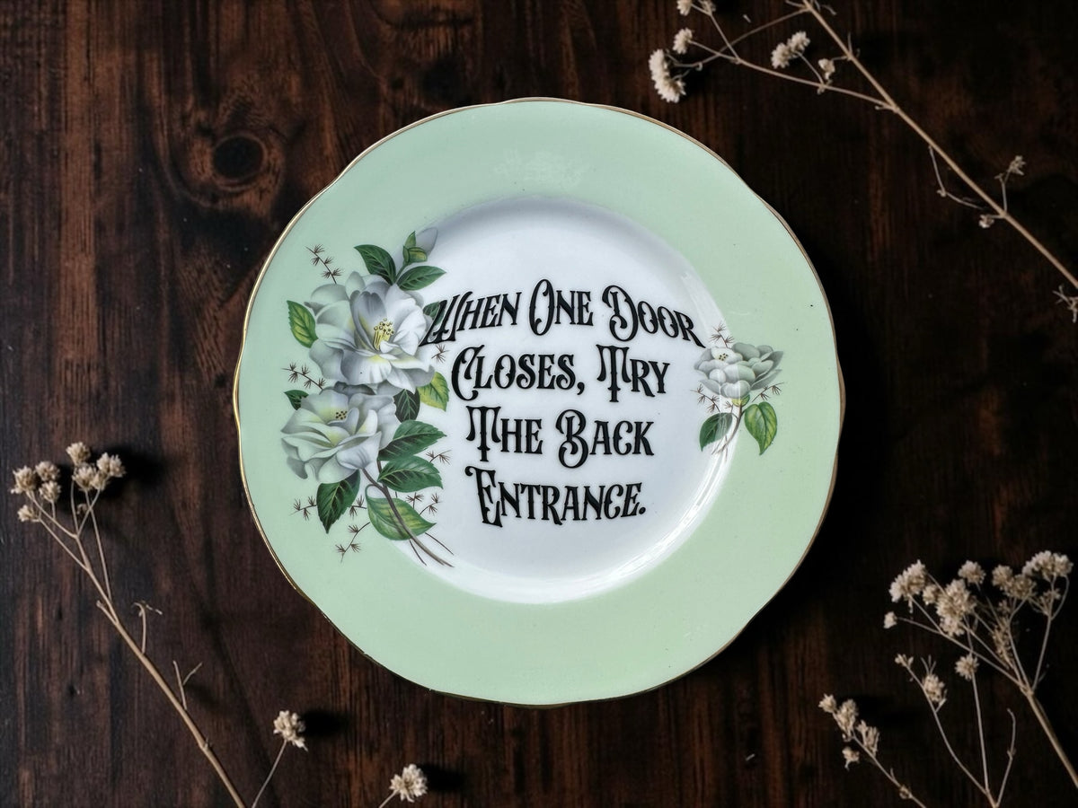 When One Door Closes, Pry the Back Entrance vintage decorative plate