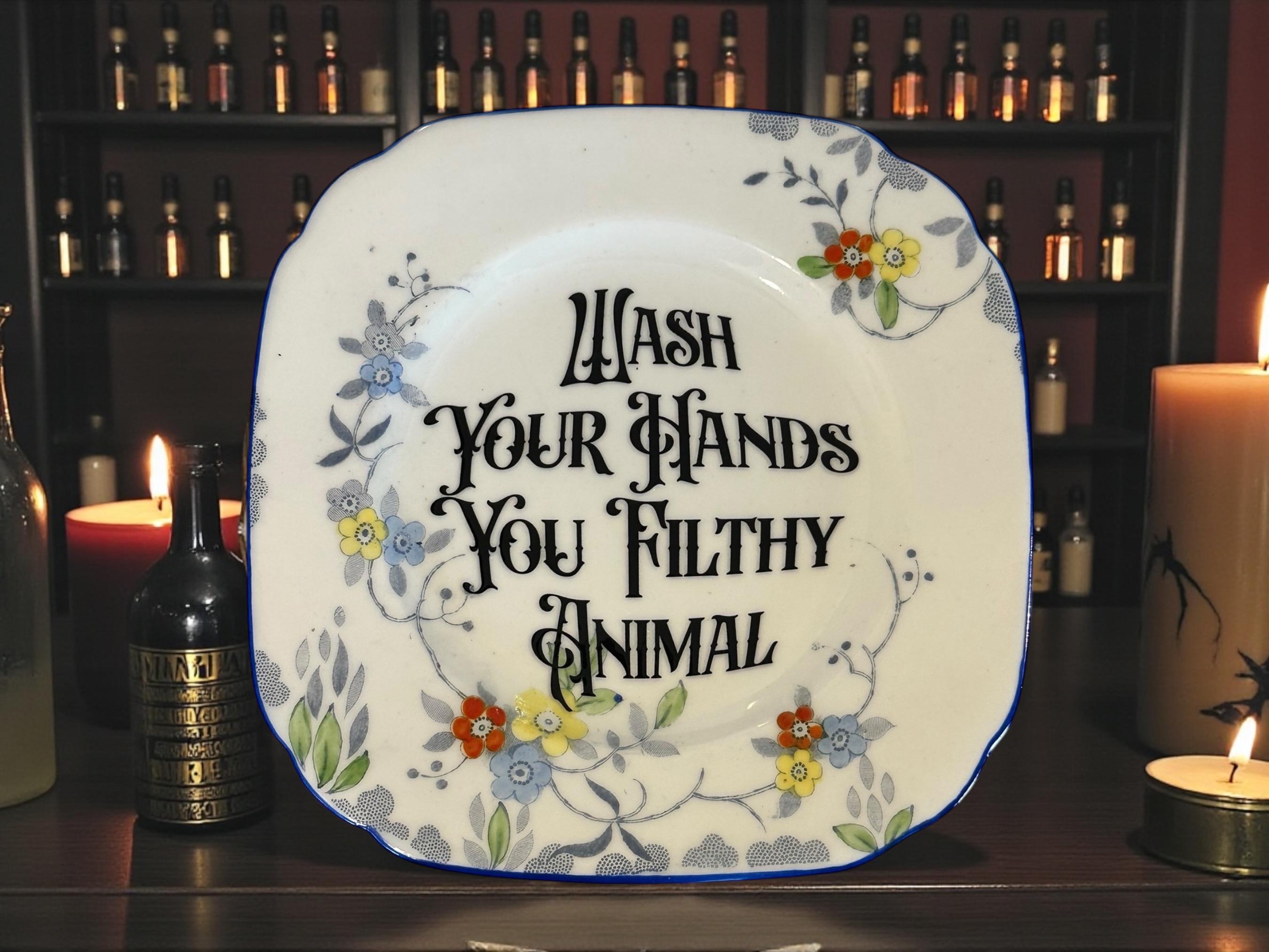 Wash your hands you filthy animal, vintage plate with stand