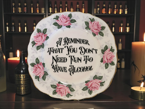 A reminder that you don't need fun to have alcohol, vintage plate with stand