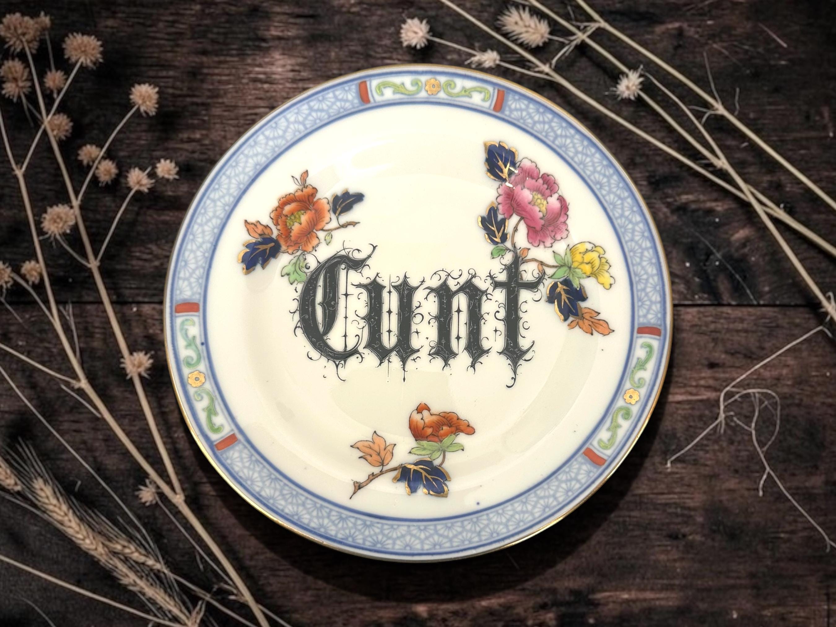 Cunt, vintage plate with stand