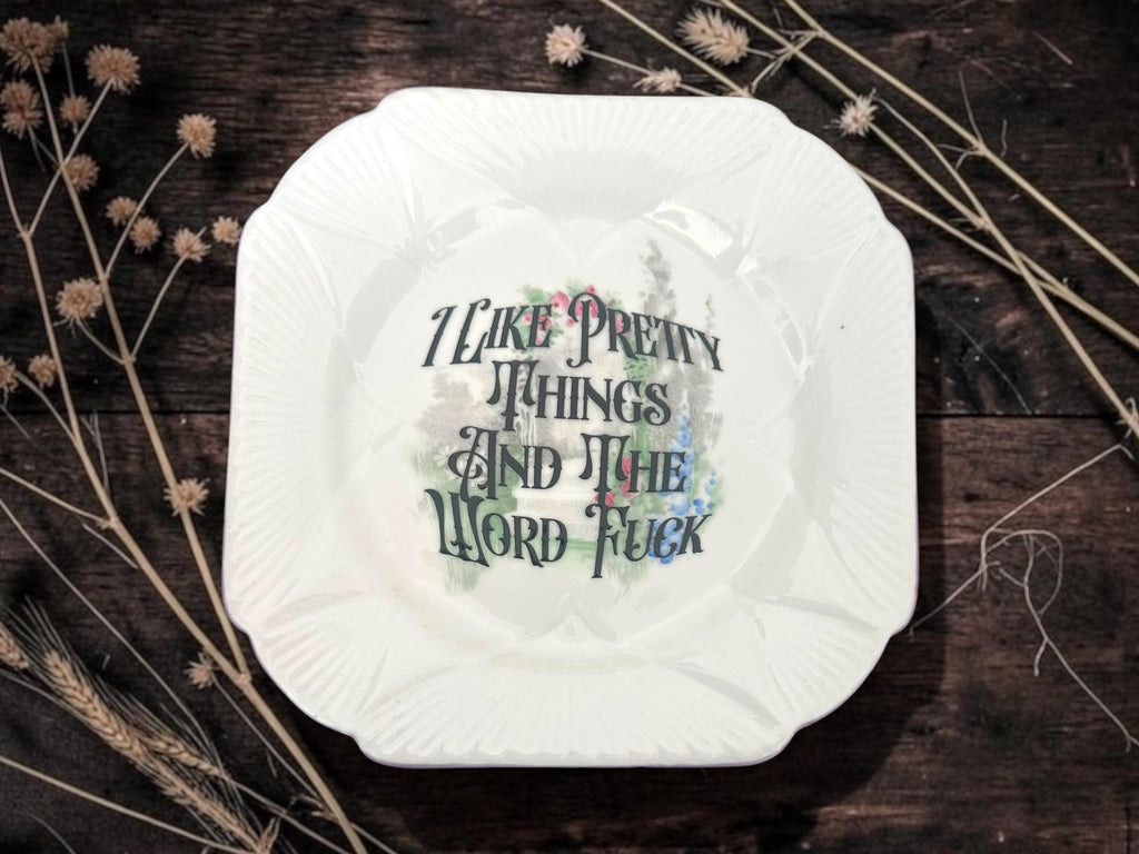 I like pretty things and the word fuck, vintage plate with stand