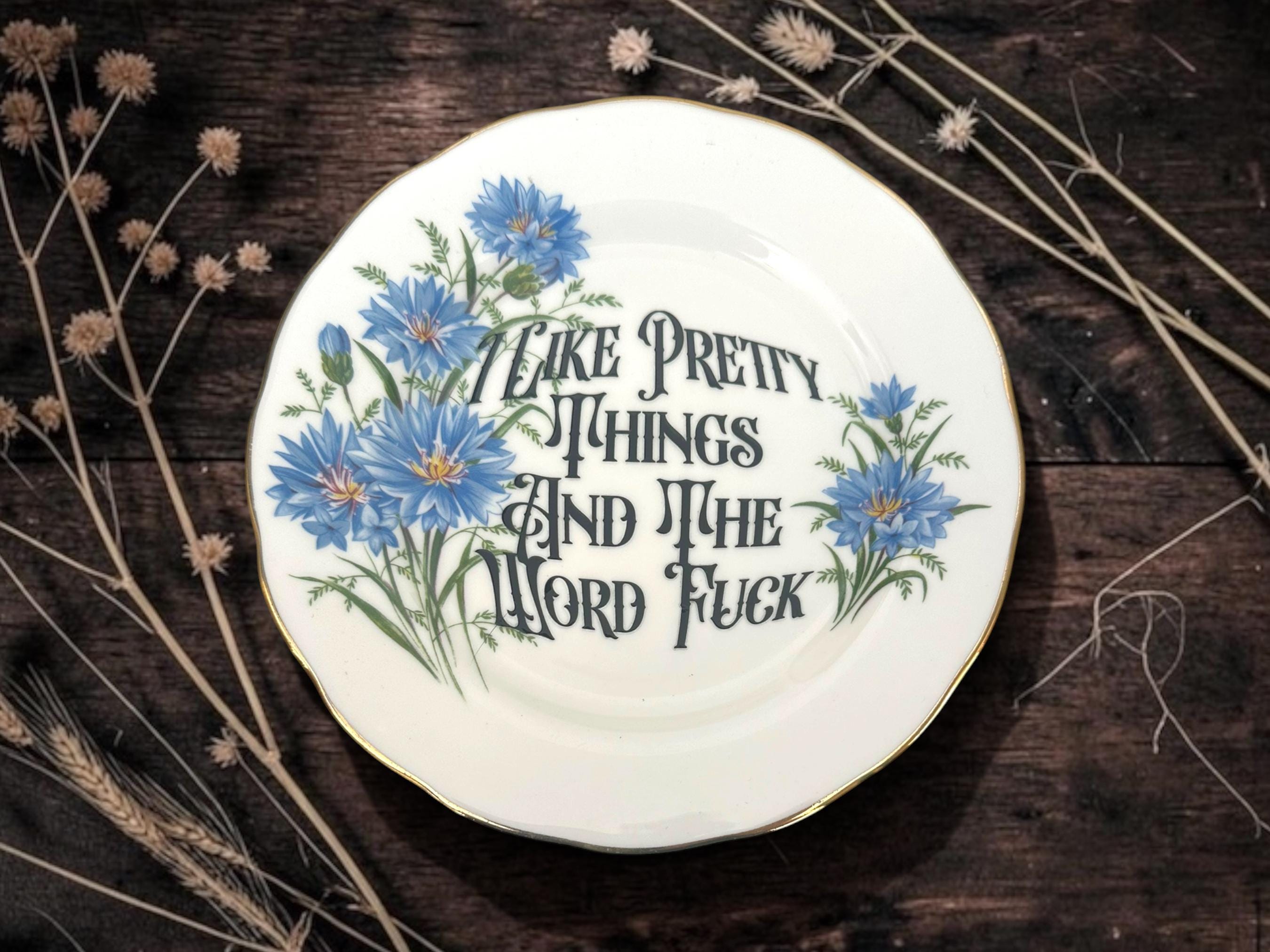 I like pretty things and the word fuck, vintage plate with stand
