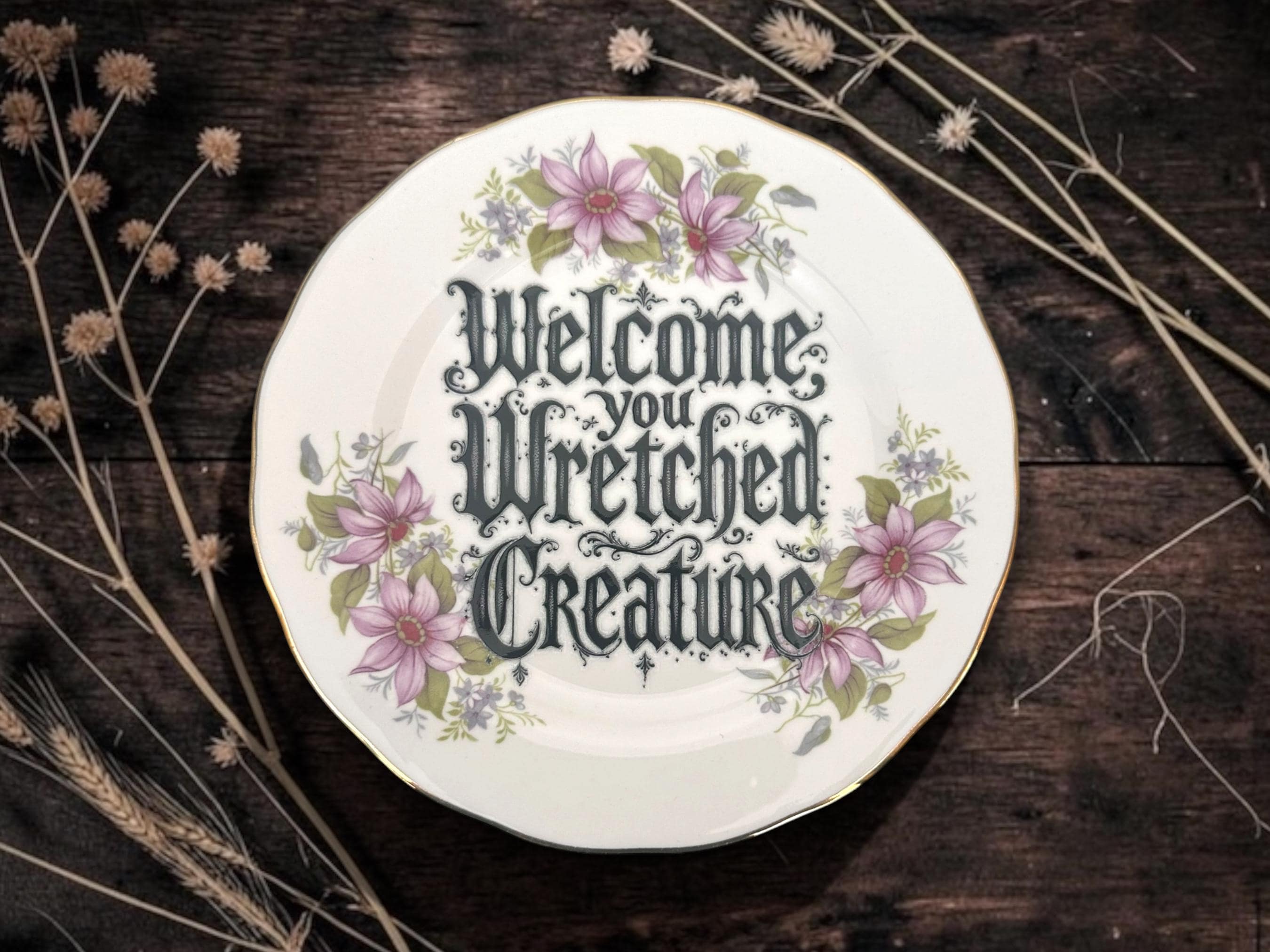 Welcome wretched creature, vintage plate with stand