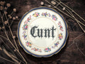 Cunt, vintage plate with stand