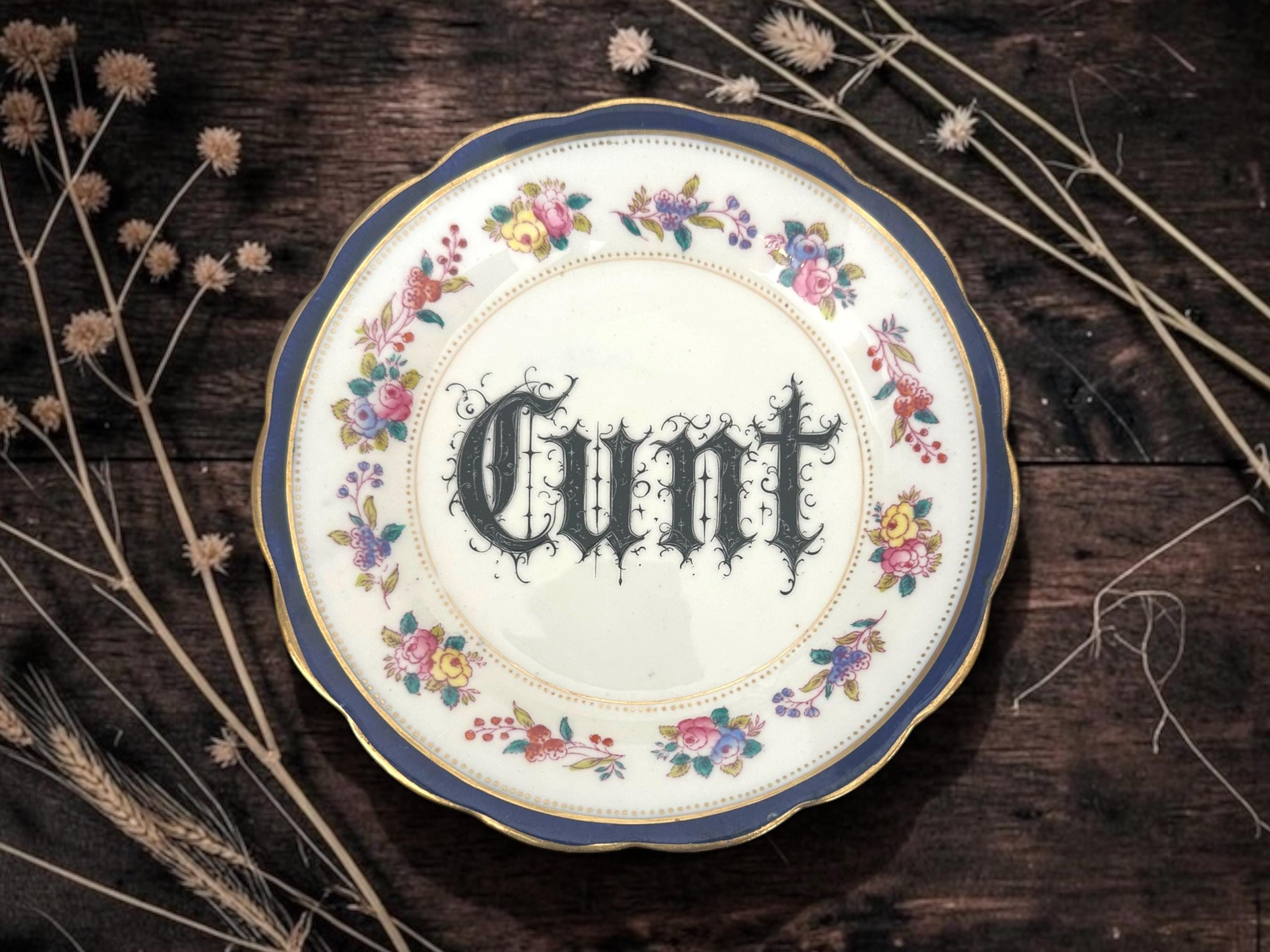 Cunt, vintage plate with stand