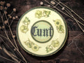 Cunt, vintage plate with stand